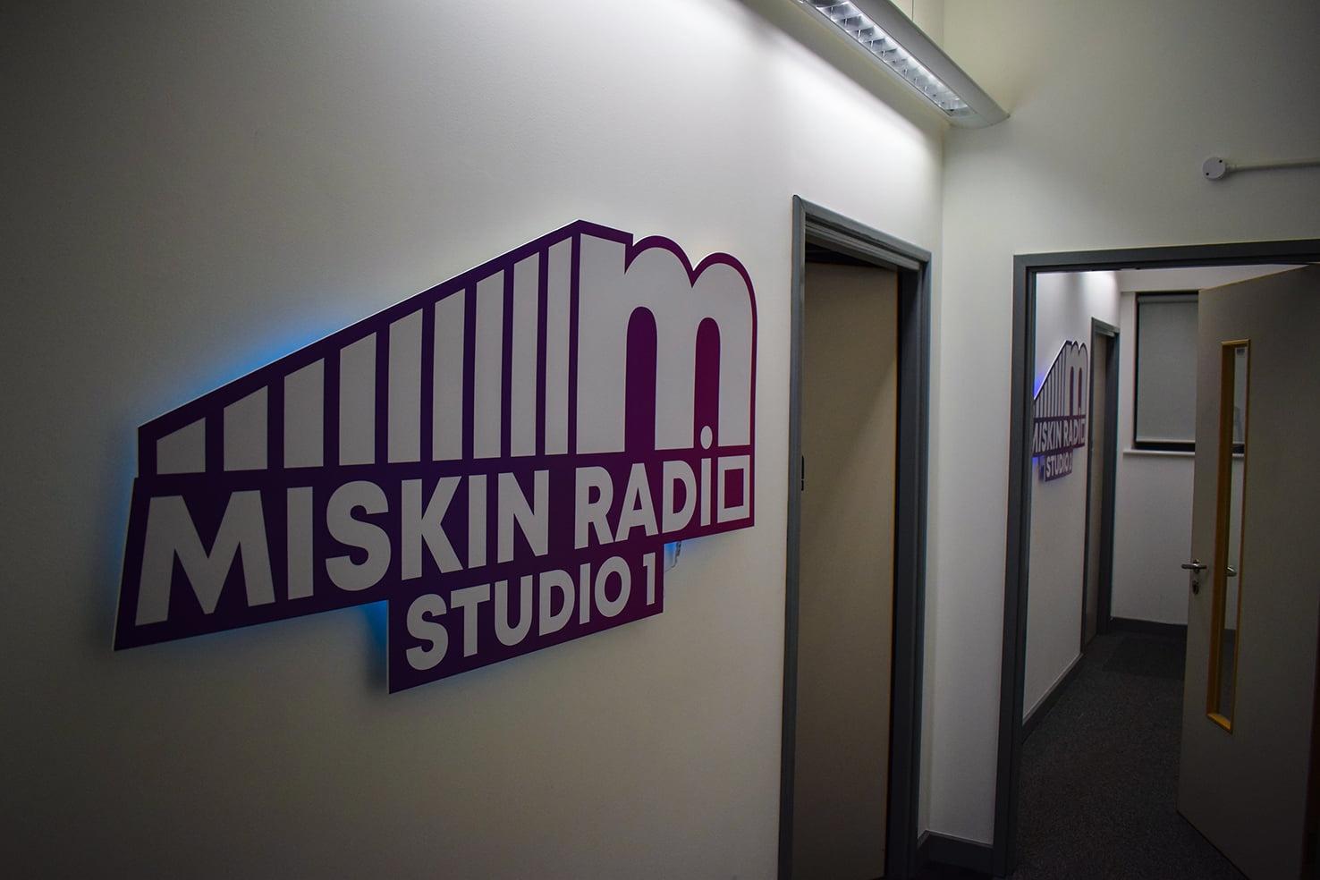 Miskin Radio Logos On Wall