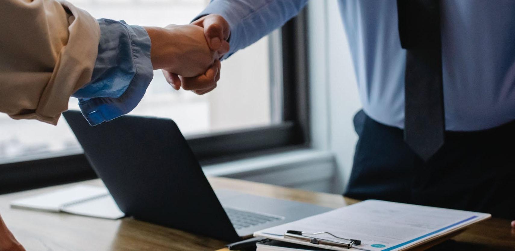 Two people shaking hands