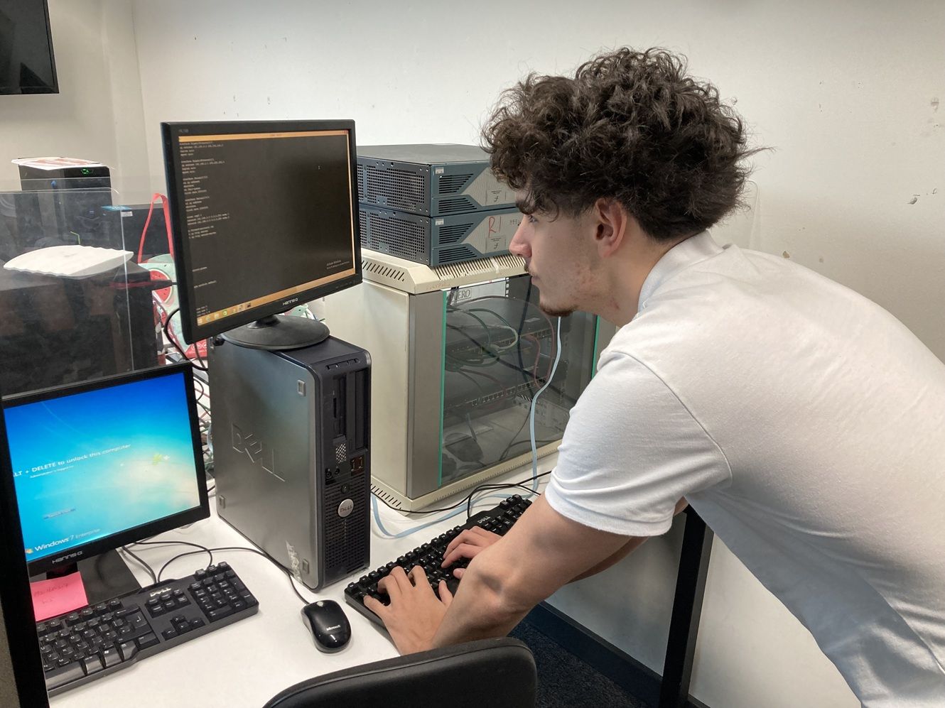 Young man looking at computer screen