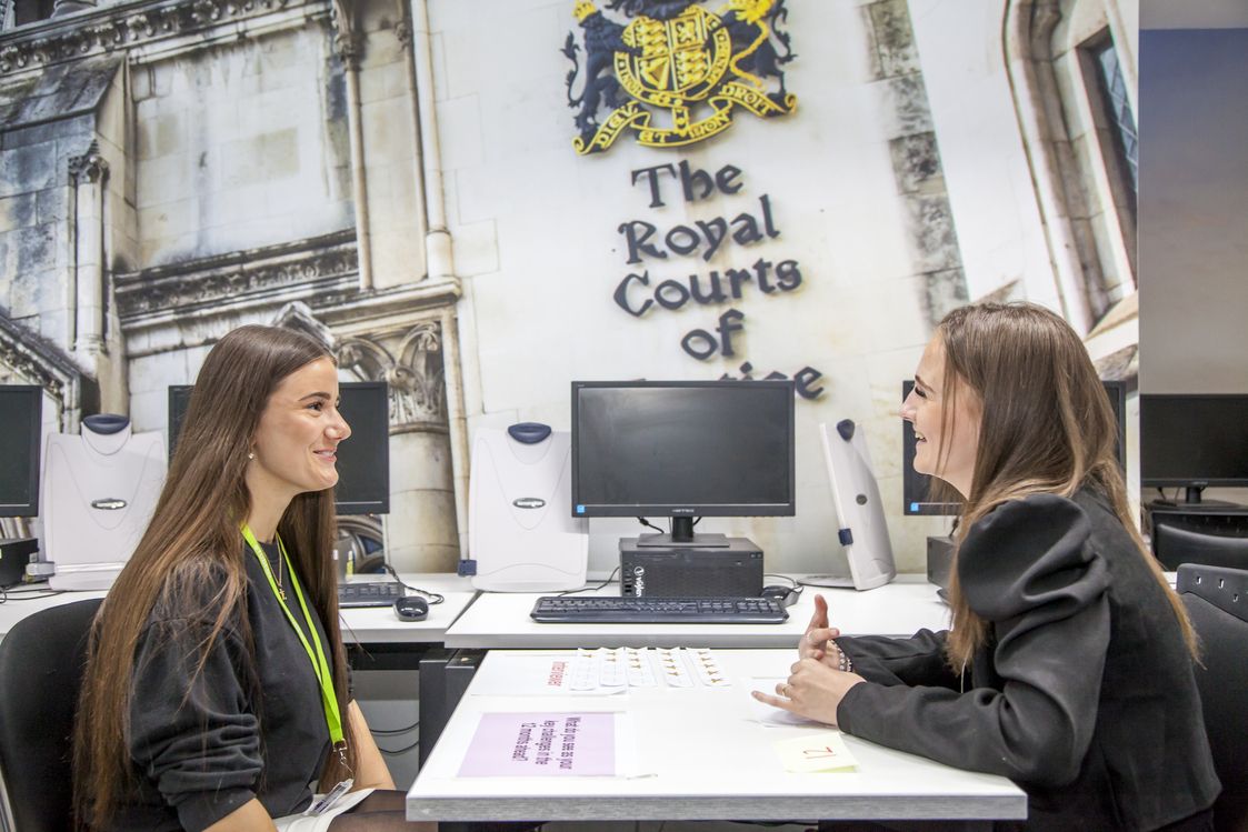 2_NKC_LEGAL_GIRLS_SITTING_AT_TABLE