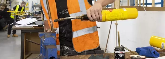 Student with a blow torch 
