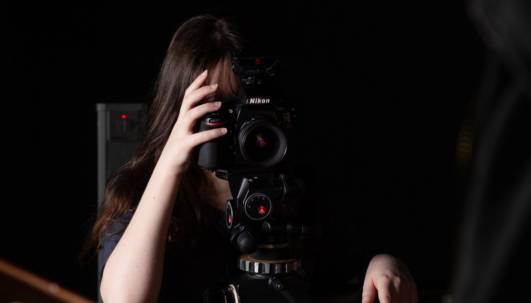 Lady behind camera