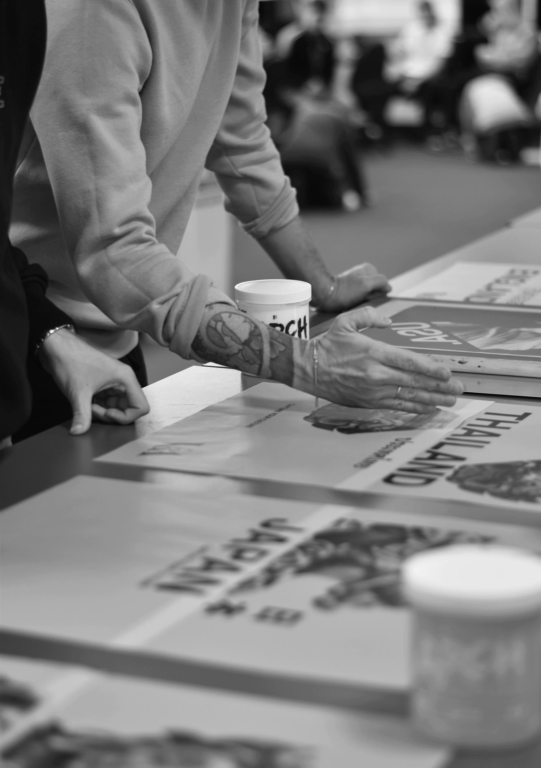 NKC_Dartford_Graphics_Work_Displayed_On_Table_Black_White