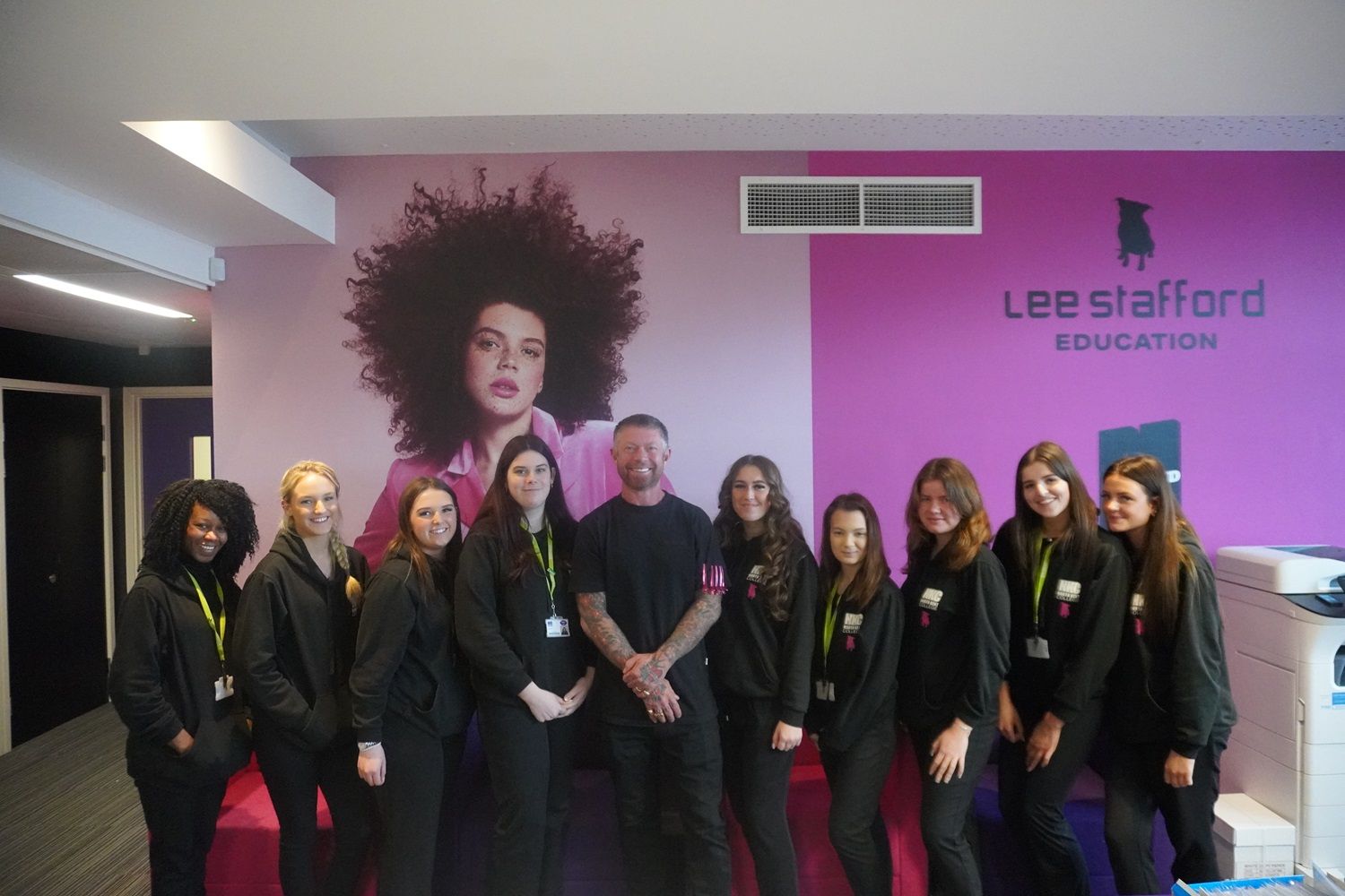 Hairdresser Lee Stafford with staff and students