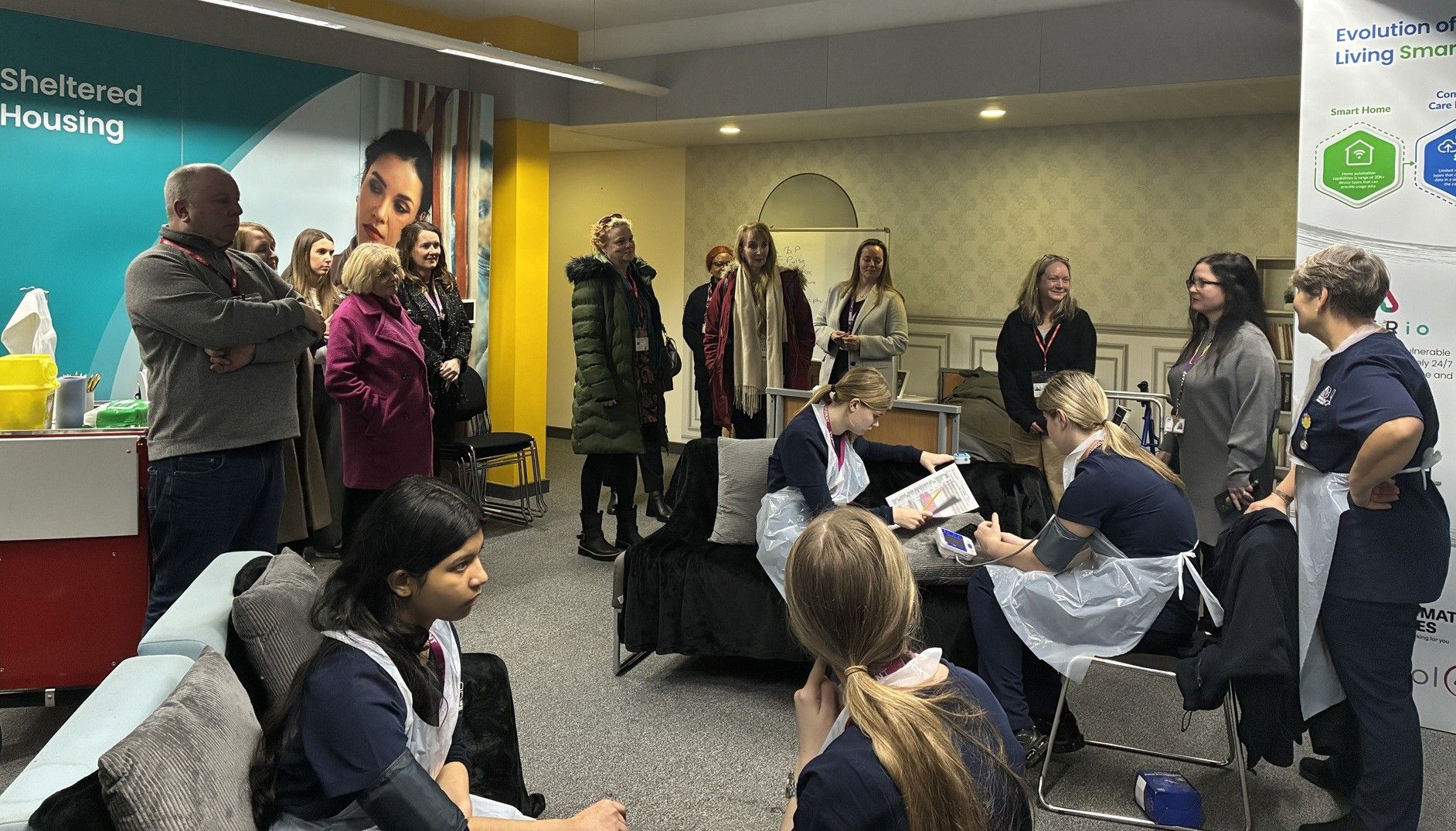 Group of people in Health and Social Care Suite