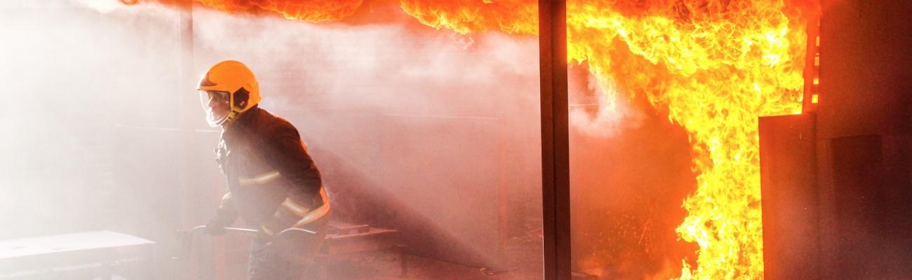 Student exiting building on fire